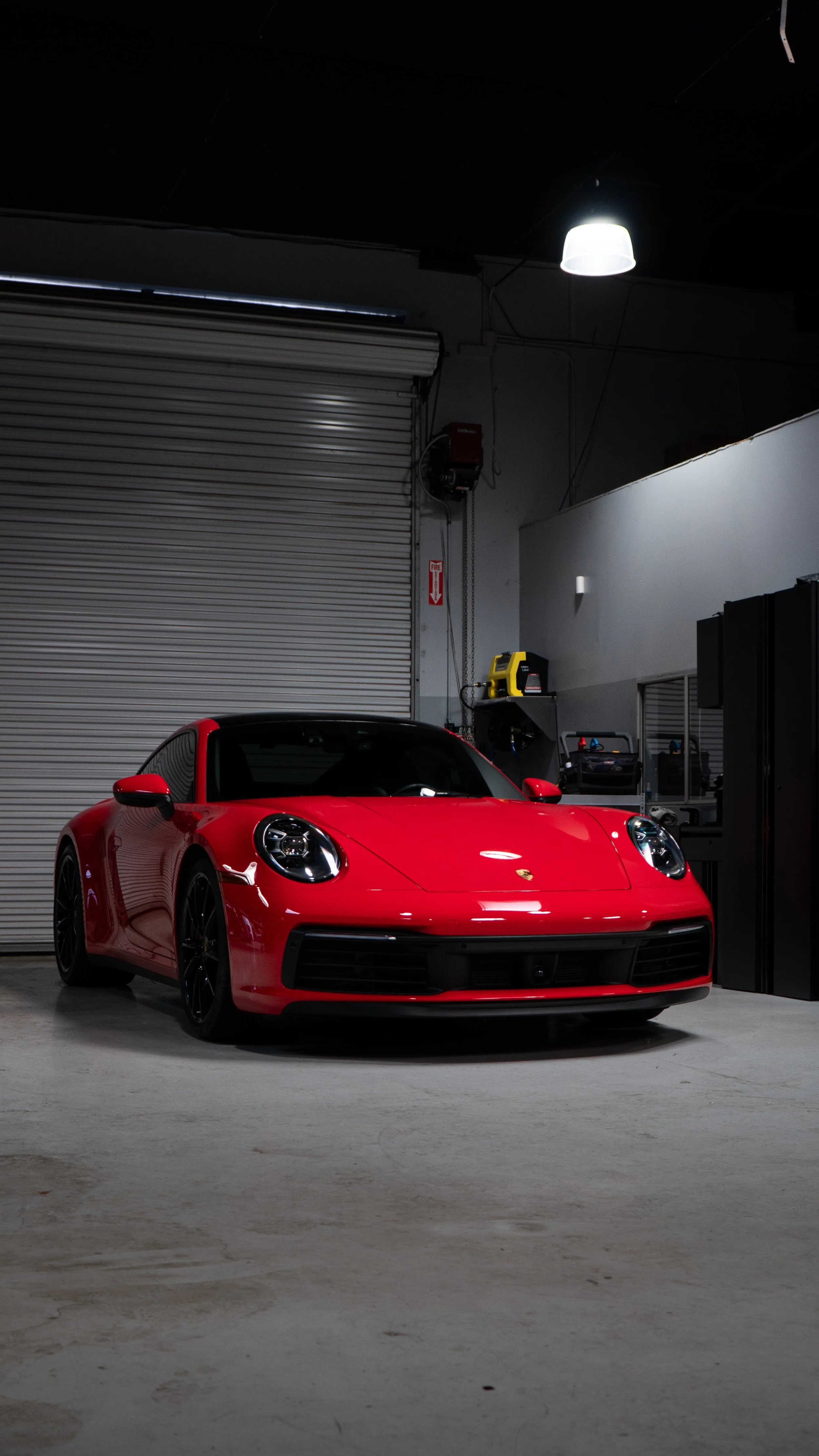 Red sports car with fresh ceramic coating in the NDG studio